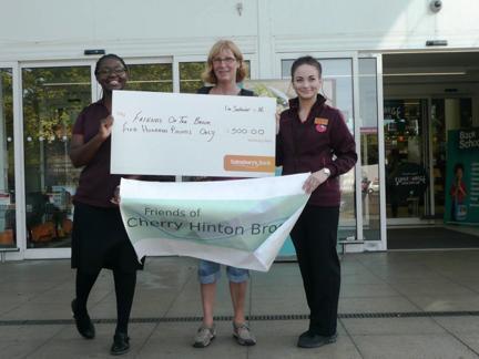 Sainsburys presenting a cheque